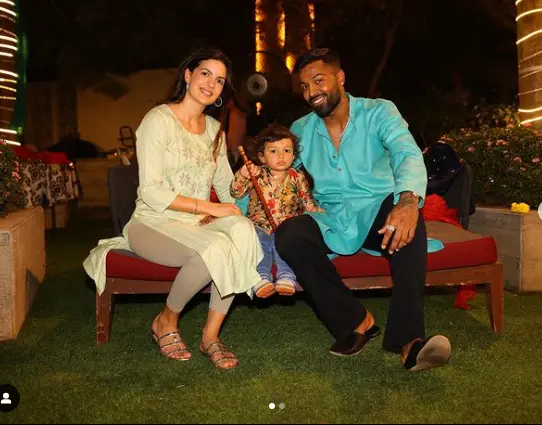 "Hardik Pandya with his wife Natasa Stankovic and their son Agastya, enjoying a family moment together."

