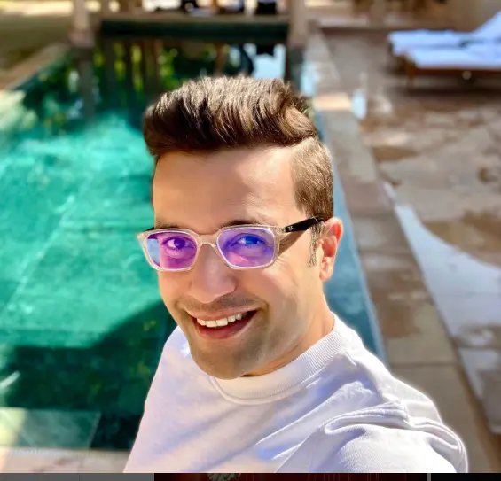 A photo of Sandeep Maheshwari and his wife, Neha Maheshwari, smiling and standing close together, showcasing their strong bond and supportive relationship.





