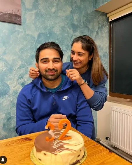 "Vinesh Phogat with her family, including her father, uncles, and cousins, who are all part of the renowned Phogat wrestling family."