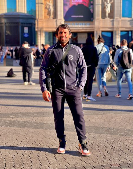 Bajrang Punia, an Indian wrestler in action, showcasing his strength and determination in a wrestling match.